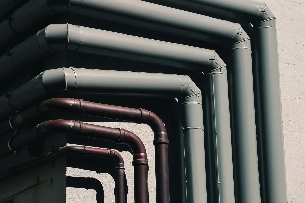 Pipes running along a wall